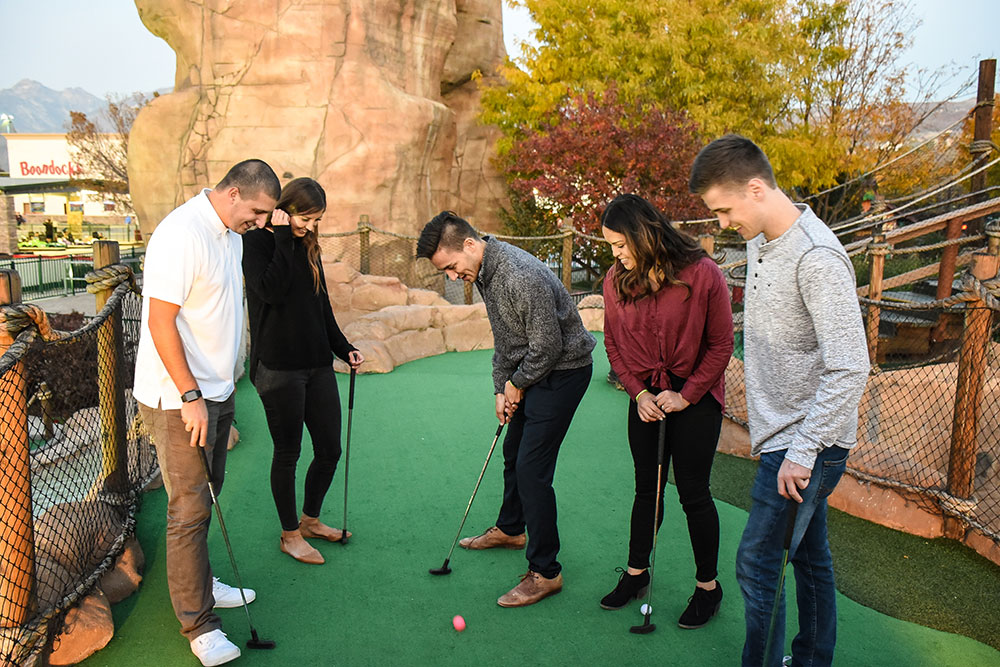 Group Playing Mini Golf