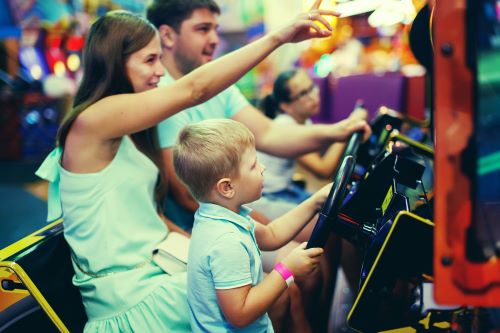 Family playing video games together